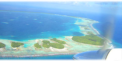 >>> Aerial showing Manihiki atoll island from plane &copy; Halina Sydow